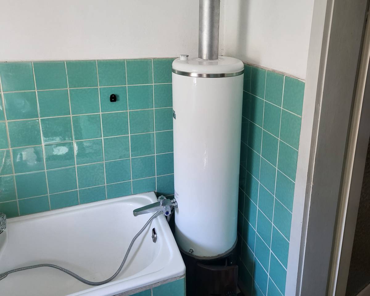 Erneuerung eines holzbefeuerten Badeofens